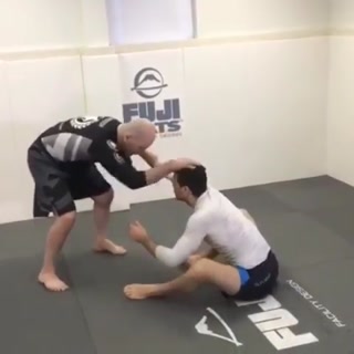 51 year old John Danaher with a great flying triangle set up