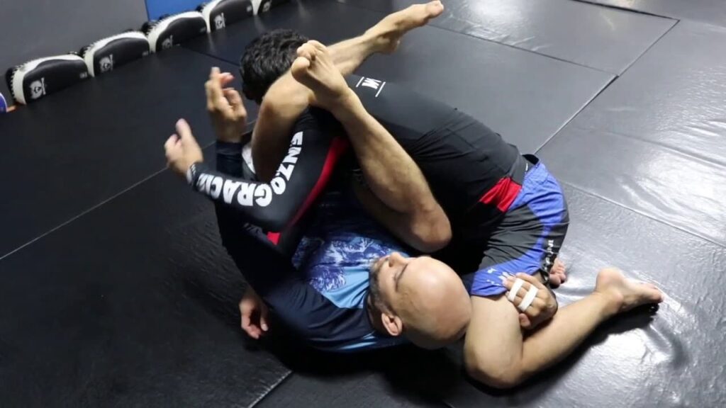 Aaron Milam - K-Guard/Squirrel Guard Armbar When Opponent Grabs Your Foot