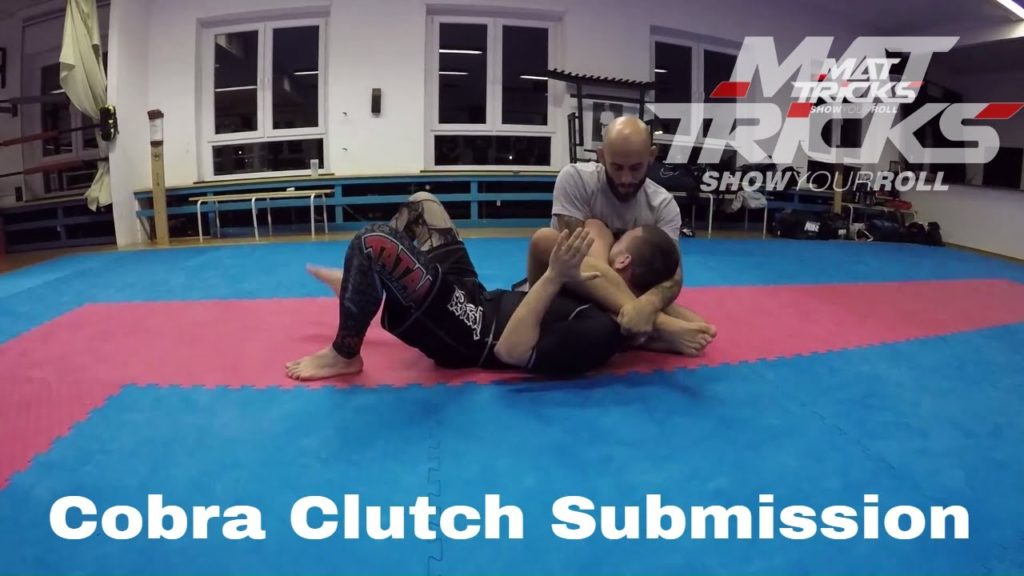 Aaron Milam shows the Cobra Clutch Submission from the Gift Wrap