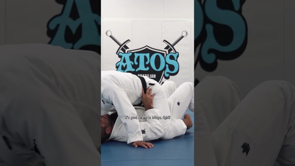 Andre Galvao teaches how to Escape from Mount Position | AtosBJJOnDemand.com