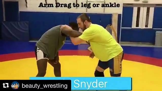 Arm drag to leg or ankle pick