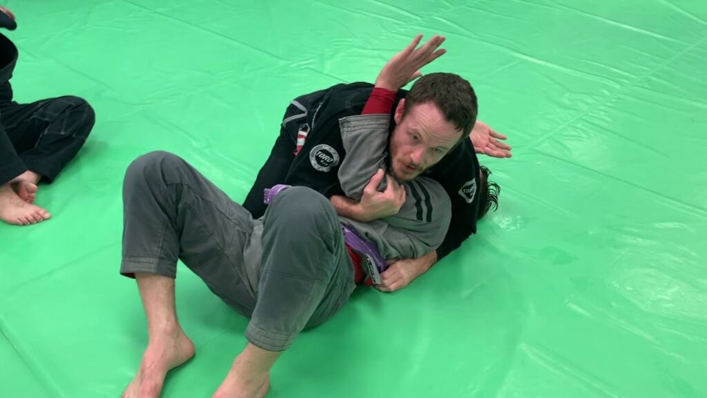 Bridge and Roll Escape (Side Control)
