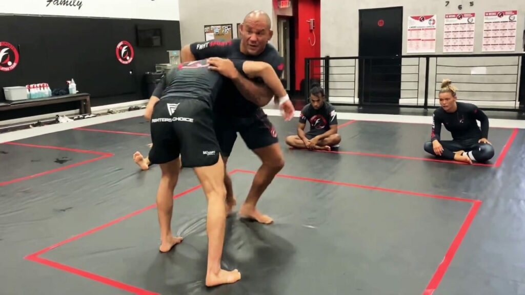 CYBORG teaches FRONT HEADLOCK to OUCHI GARI & FRONT HEADLOCK to ANKLE PICK