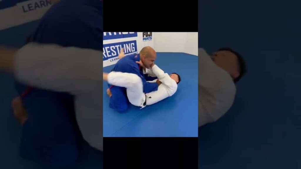 Cross Collar Choke to Armbar by HENRY AKINS