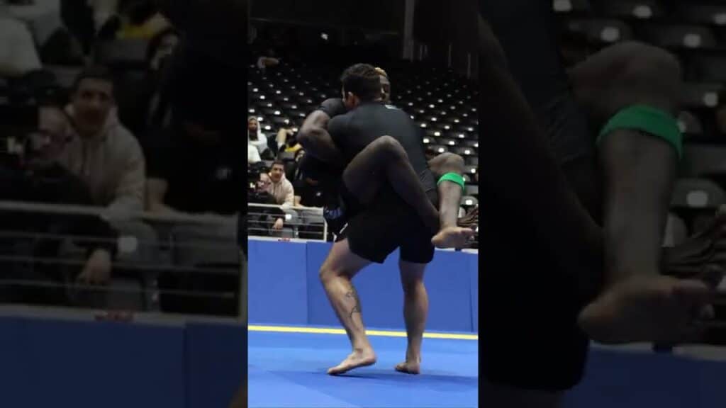 Davi Cabral Stands with the Giraffe