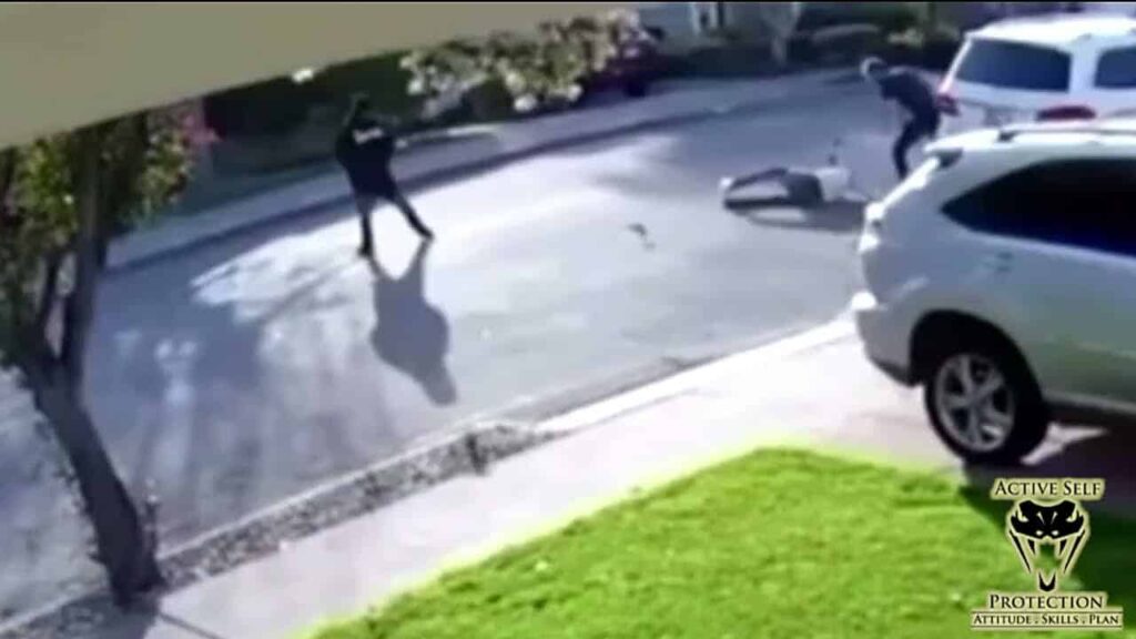 Defender Body Slams Kid Who Pointed A Gun At Him