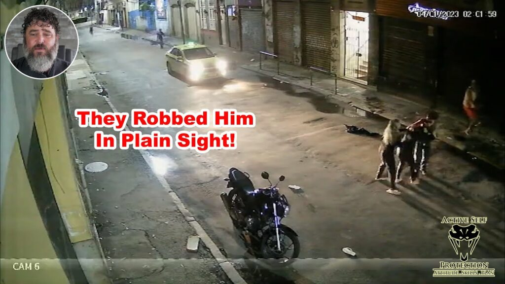 Defender Tries Disarm Against Two Attackers