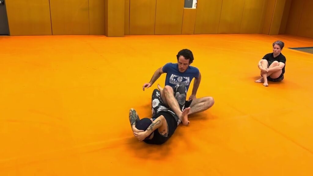 Early Backside 50/50 Escape and Countering with a Crossbody Ankle Lock