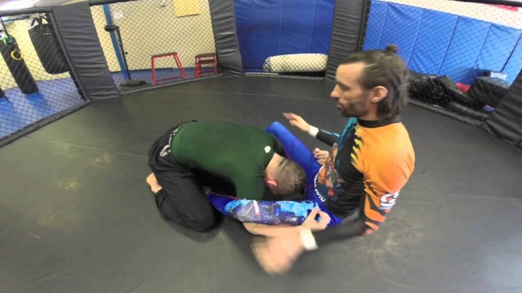 Evil Ninja Choke from under-hooks (from guard)