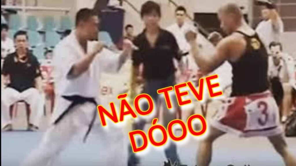 FAIXA PRETA DE KARATE PARTE PRA CIMA DE LUTADOR DE MUAY THAI MACHUCADO