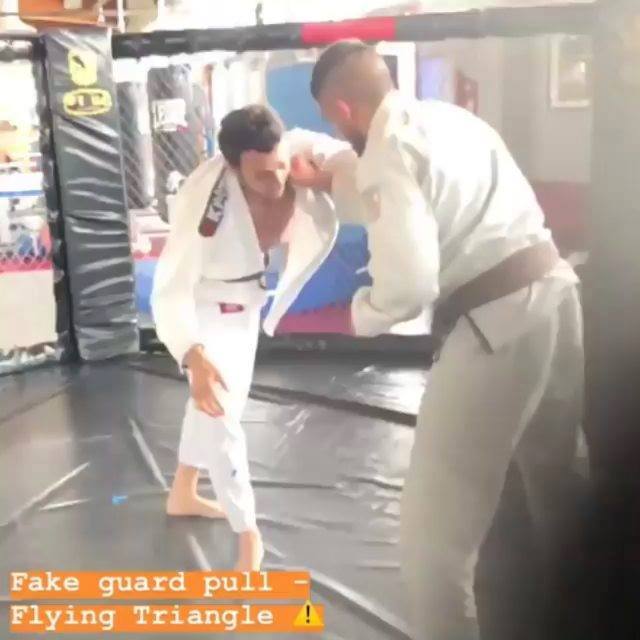 Fake guard pull /
Flying Triangle 
 credit @jacopo_madaro