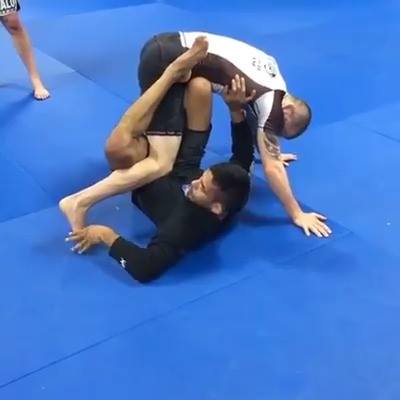 Footlock + Toe Hold from Butterfly Sweep