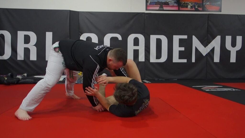Guard pass and following his hip escape