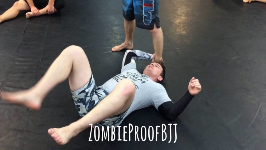 How To Do The Imanari Roll (From Seated Guard) - ZombieProofBJJ (NoGi)