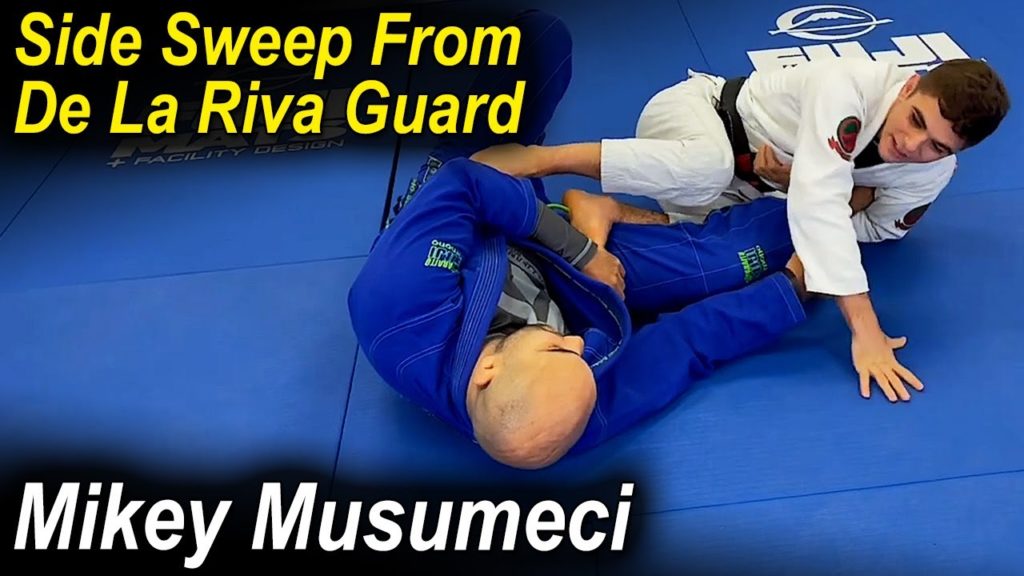 How To Do The Perfect Side Sweep From De La Riva Guard by Mikey Musumeci