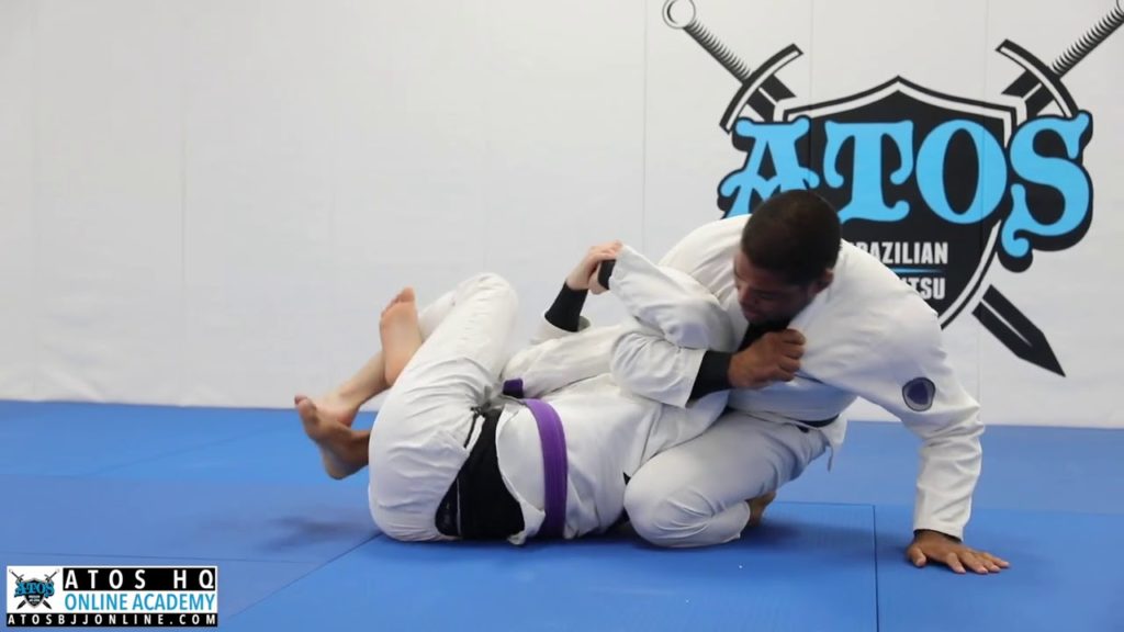 How to Apply an Arm Bar From Half Guard - Andre Galvao