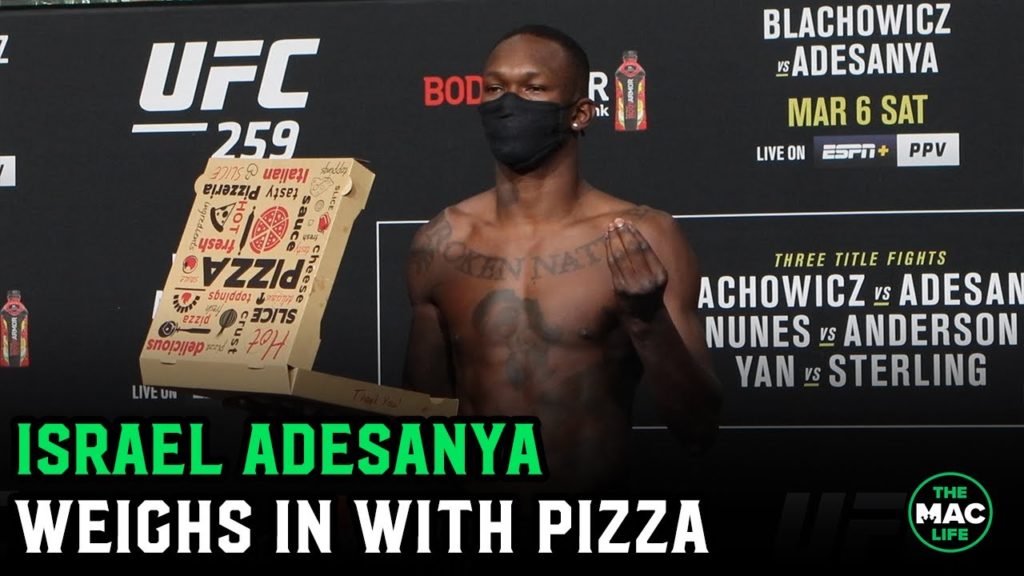 Israel Adesanya weighs in with pizza for light heavyweight debut at UFC 259