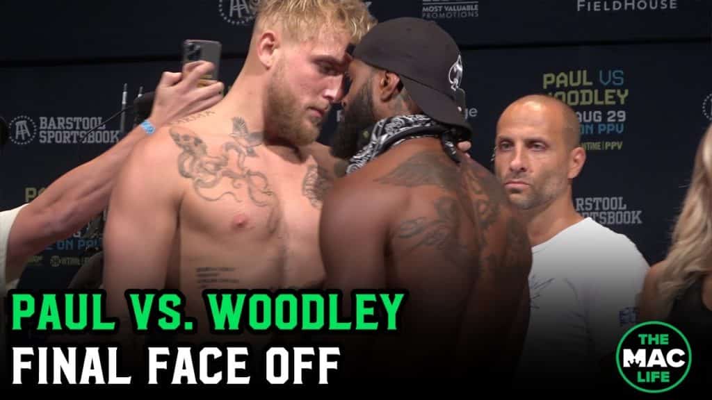 Jake Paul rushes Tyron Woodley at final face off; Woodley doesn't flinch