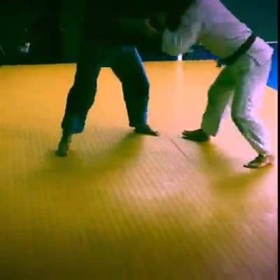 Judo Olympian Flavio Canto drilling his guard pull to rolling armbar