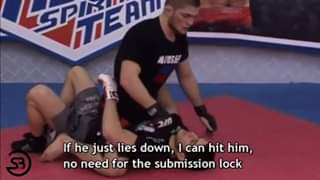 Khabib demonstrating an armbar from S mount