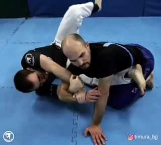 Kimura Grip Arm Bar From Closed Guard