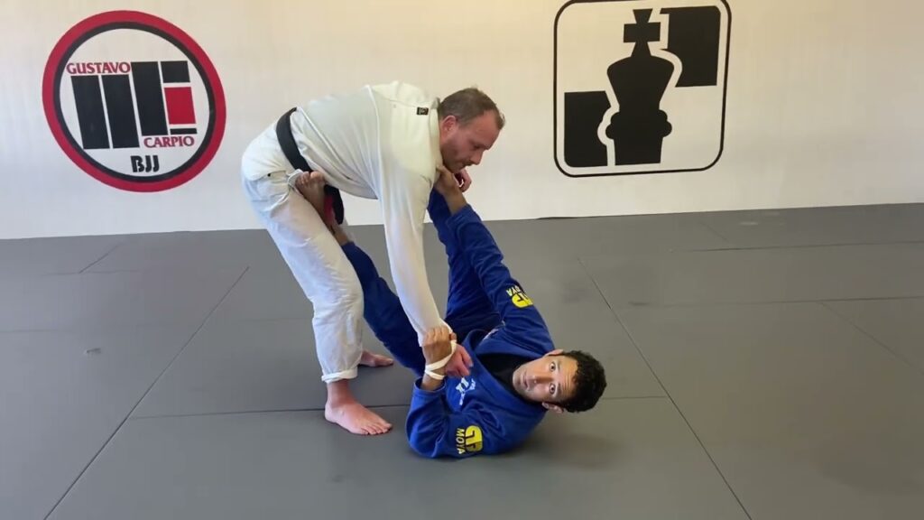 Lapel Guard: Double Ankle Sweep to Half Guard Pass