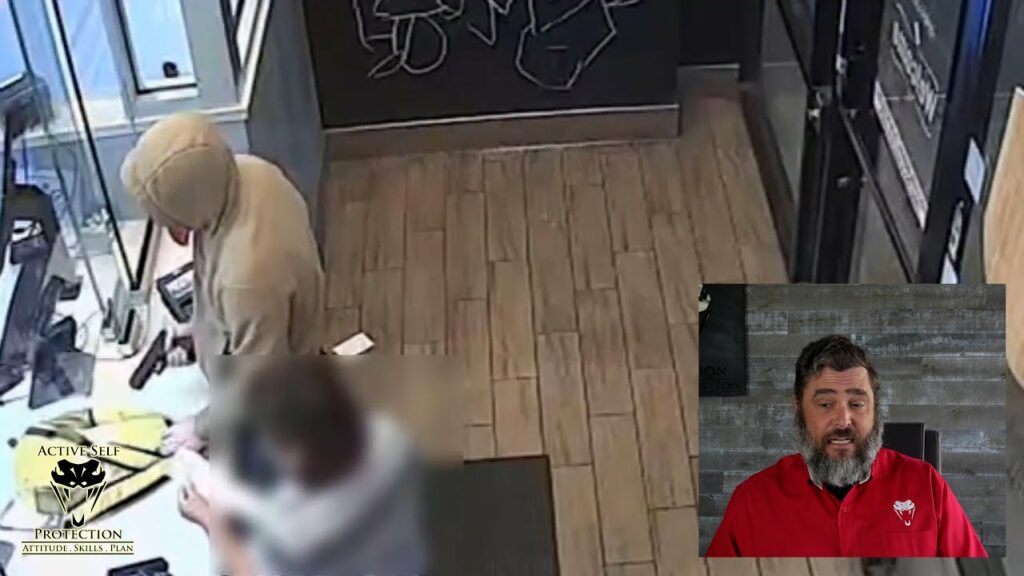 Man Robs Store While Bystander Stands Two Feet Away