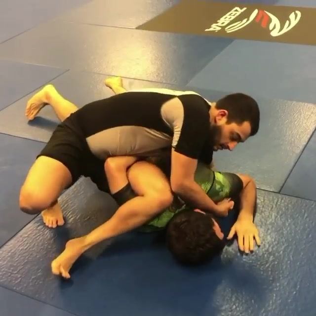 Mounted gogoplata to omoplata ()  Rubber Guard Assassins