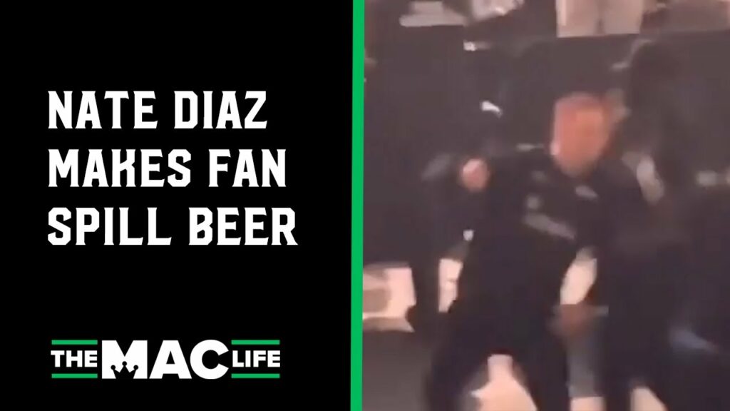 Nate Diaz fakes a punch and makes fan flinch and spill beer