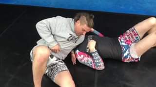 North-South Choke From Knee On Belly
