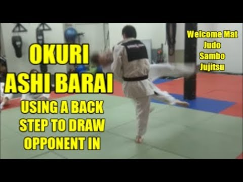 OKURI ASHI BARAI USING A BACK STEP TO DRAW OPPONENT IN