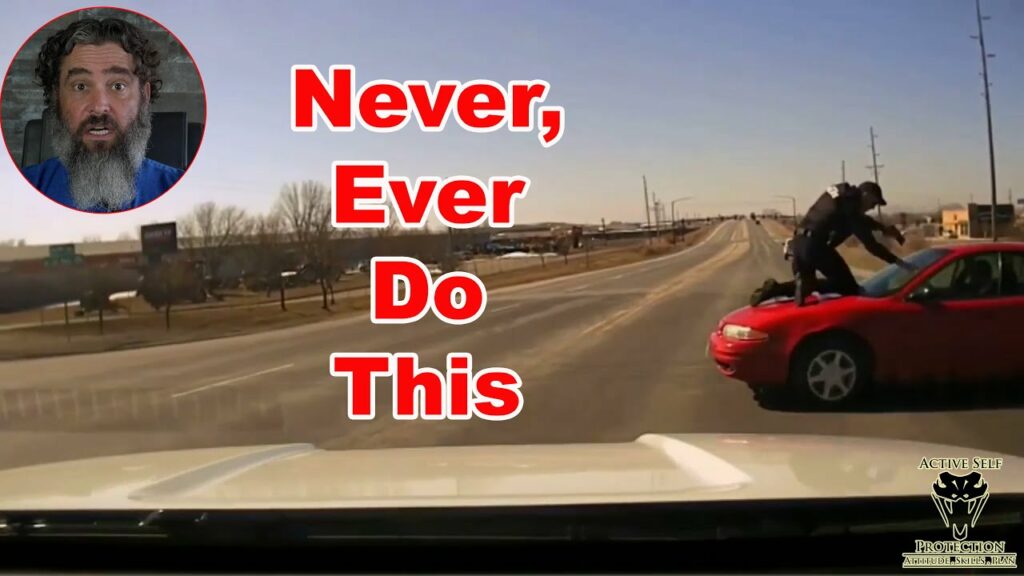 Officer Jumps On Car Hood To Stop A Fleeing Felon