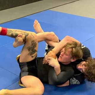 Omoplata Crucifix Choke from the Rubber Guard by @jordanwearsnogi