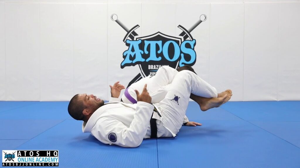 Omoplata from Hooks Guard - Andre Galvao
