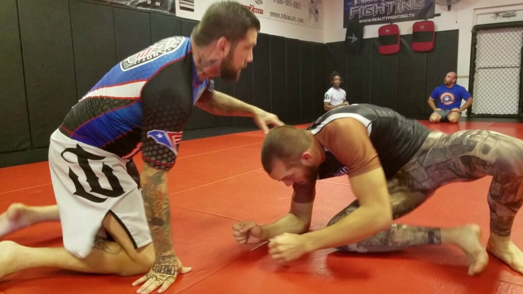 Peruvian Necktie to Gator Choke and Armbar