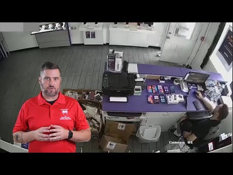Phone Store Employee Smokes Armed Robber