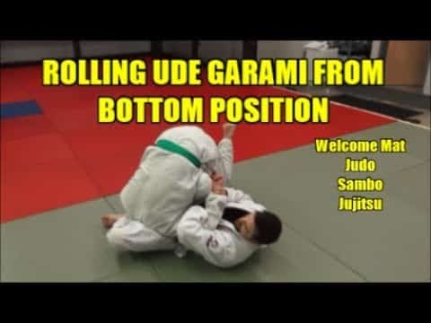 ROLLING UDE GARAMI FROM BOTTOM GUARD POSITION