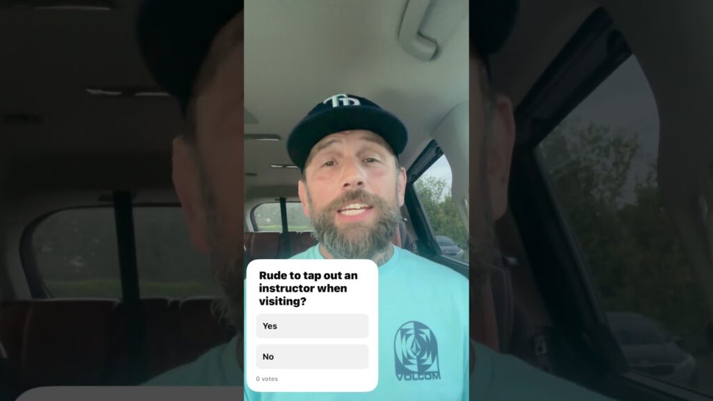 Rude to tap a coach when visiting?