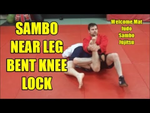 SAMBO NEAR LEG BENT KNEE LOCK
