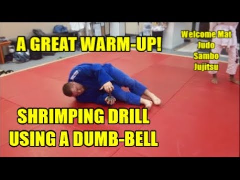 SHRIMPING DRILL USING A DUMB BELL AS A WARM UP