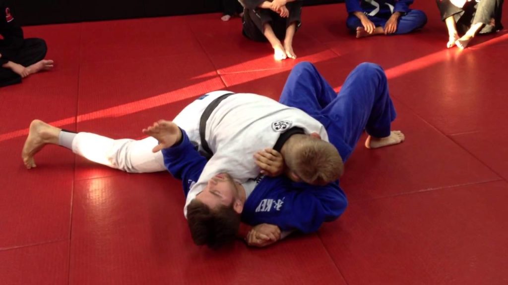 Side control escape against tight top pressure
