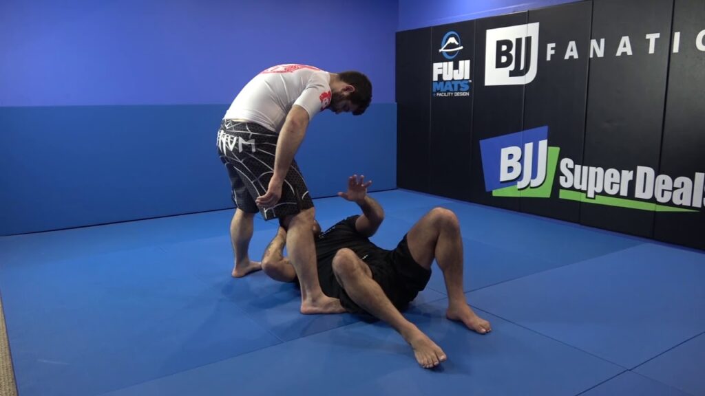 Sitting Guard Retention Against Standing Opponent by Tom DeBlass