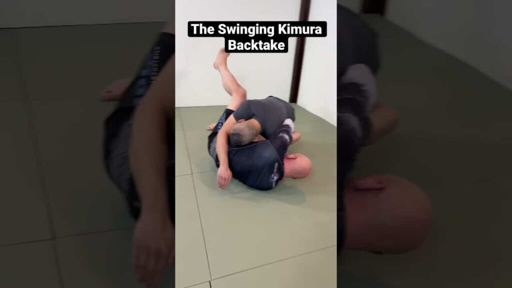 The swinging Kimura backtake is quite a high percentage move if you use the  to tilt his body