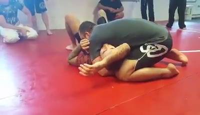 Tom DeBlass - reverse head and arm/d'arce choke