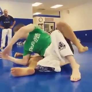 Tom DeBlass shows how to take the back from top half guard