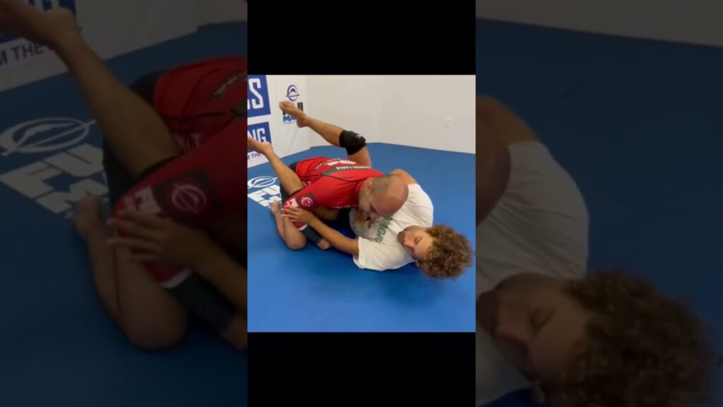 Triangle Choke Variation from Closed Guard by Magid Hage