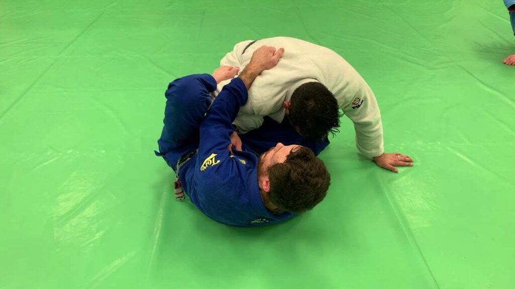 Using Shin-On-Shin to Transition from Knee Cut to a Butterfly Guard Sweep