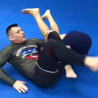 Very nice reverse Omoplata details by Mr. Vlad Koulikov