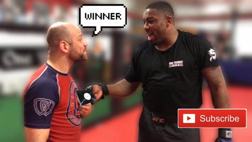 Walt Harris gives Brandon Mccaghren his “Black Card"